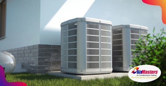 Two heat pump units outside a home