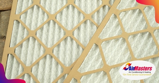 Two air filters sitting on top of one another