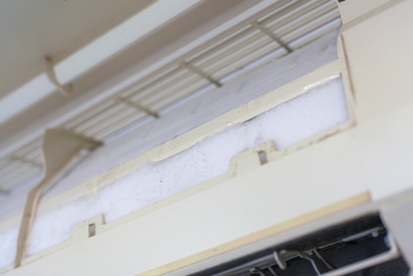 Cleaning the ice on the air filter.